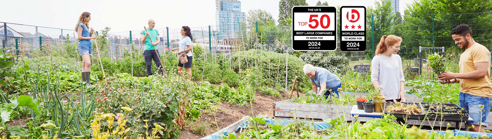 A group of people working in a garden. Overlaid with badges of 'Top 50 best large companies to work for' and 'World Class to work for'