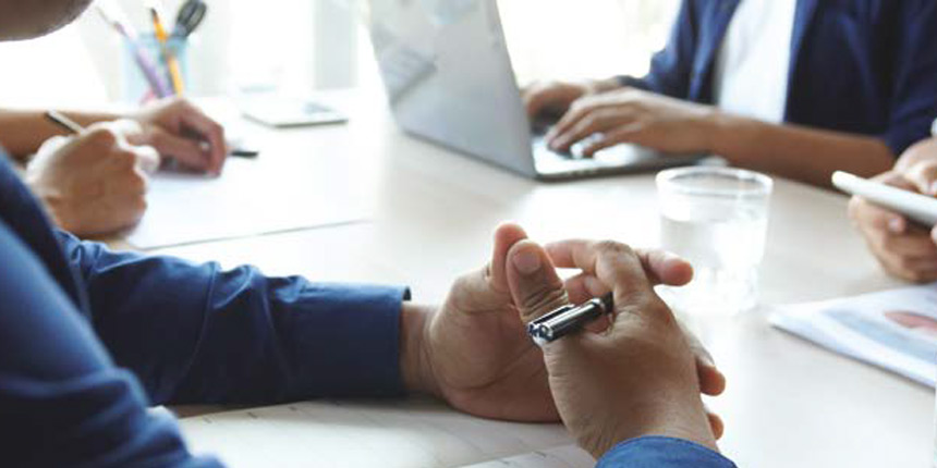 A business meeting around a table