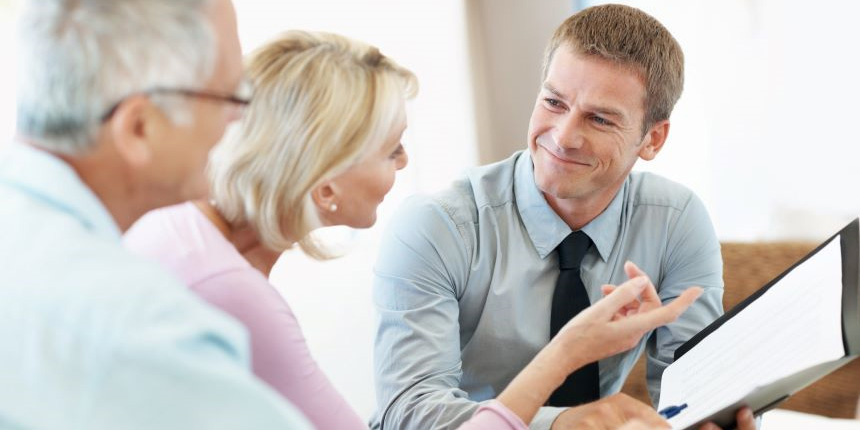 A couple having a meeting with a financial adviser.