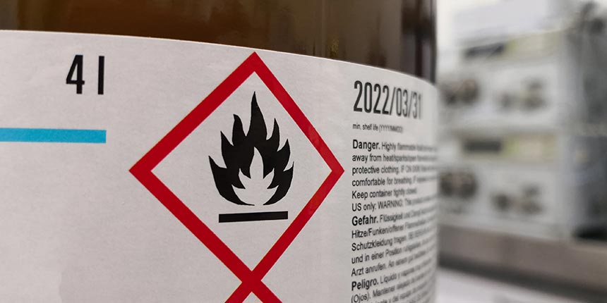 Flammable warning on bottle of chemicals