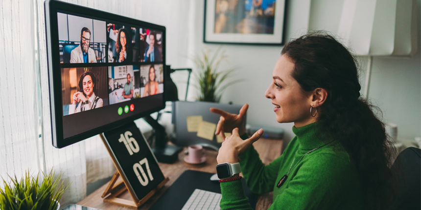 A person working from home on a video call with colleagues. 