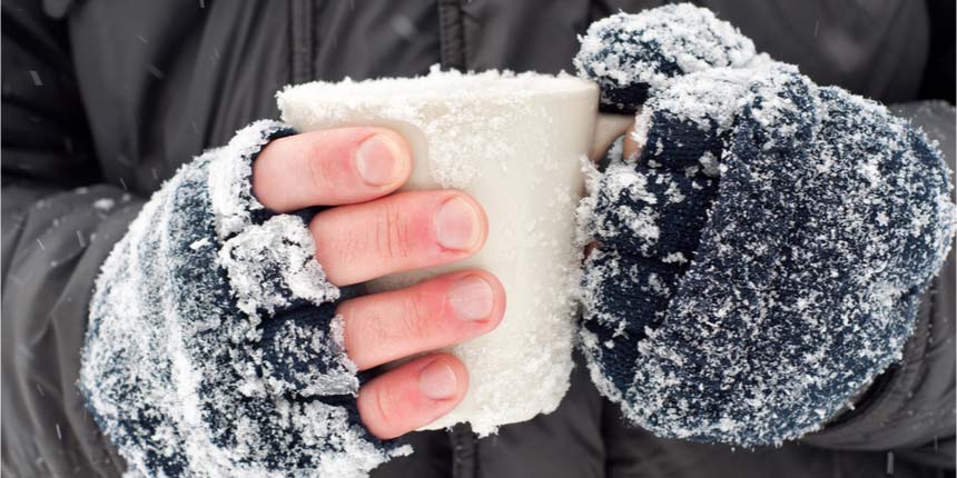 Icy hands wrapped in gloves